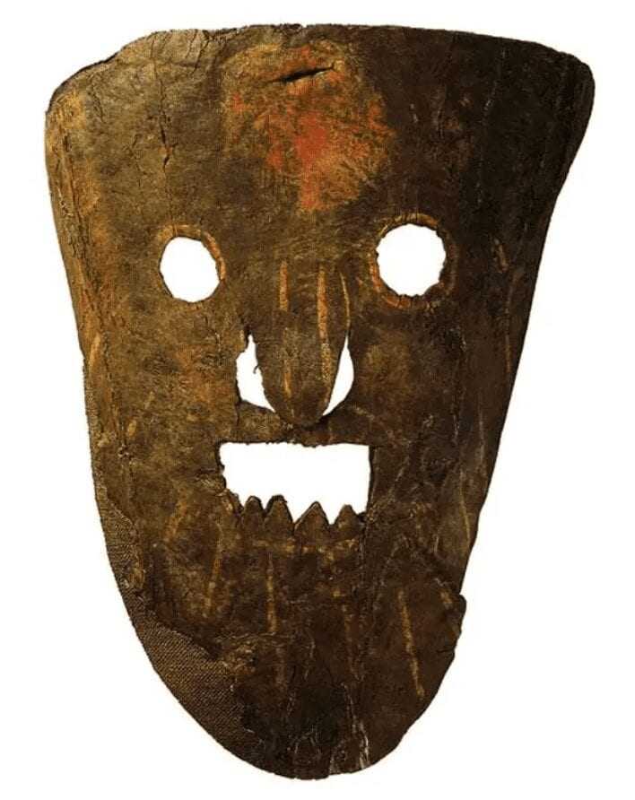 Picture of a leather 13th-century mask found in Novgorod.